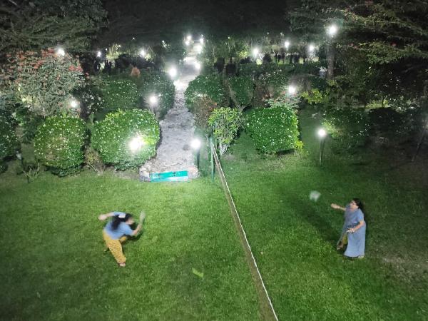 Guests Playing Badminton