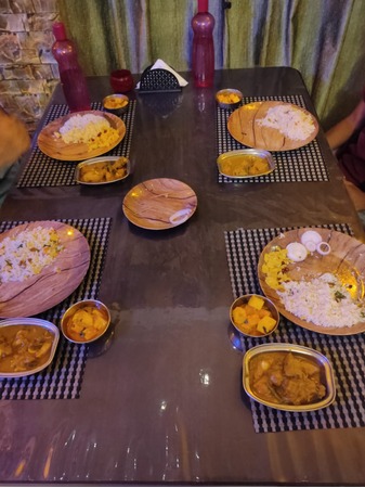 tourists enjoying food in chander pahar homestay,rajabhatkhawa,buxa tiger reserve,735227